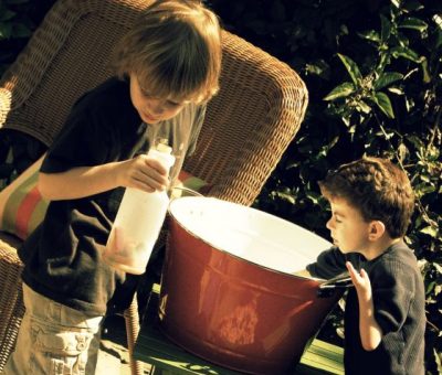 a bucket of water and a sunny afternoon.